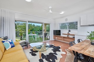 Superior living area at Cairns beachfront accommodation